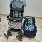 عربة أطفال مع كرسي سيارة