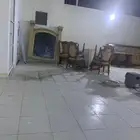 طاولة طعام ودواليب مطبخ