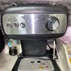 مكينه قهوه وتسوي الحليب المبخر