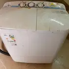 غساله وكرسي اطفال وعربة اطفال