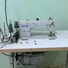 مكينة خياطة مع طاو