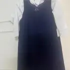 زي روضة طفل وطفله ابيض وكحلي