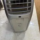 مكيف فريون متنقل ومكنسة بيسل