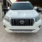 تويوتا برادو نص فل TXL V6 ابيض ممشى 112 الف بنزين 2020