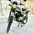 سوزوكي AX100 الاصلي