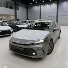 تويوتا كامري E هايبرد سعودي 2025 ابيض ورمادي