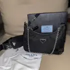 شنطة برادا اصليه مع كامل ملحقاتها مستعمله