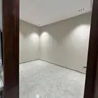 شقة جديدة للإيجار   حي القادسية خلف جامع المهيدب