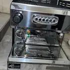 مكائن قهوة ومطحنة