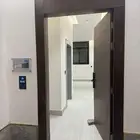 شقة جديدة بعمارة بحي اليرموك شرق الرياض