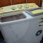 كنب اربع قطع مع ثلاث مخدات وثلاث تكايات وغساله