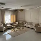 اثاث مجلس كامل مع طاولات وسجاد