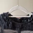 فستان سهره اسود من المصممة إيمان السحيم