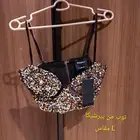 ملابس نسائيه توبات