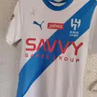 توقيع شخصي من عمر عبدالرحمن على طقم الهلال الرسمية