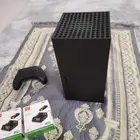Xbox Series x  مع العابه ويده وأسلاكه.