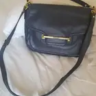 شنطة من كوتش أصلية بحالة ممتازة