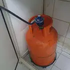 قارورة غاز غير فارغة مع منظم