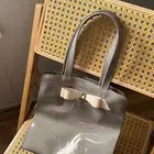 تيد بيكر حقيبة يد صغيرة بدون سحاب او جيب