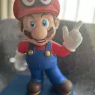 تحفه على شكل دميه