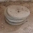 حجر الرحى القديمة الطحين