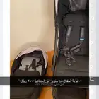 عربة أطفال مع سرير