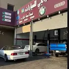 مركز كراجي لصيانة السيارات ( مرسيدس - بي ام - رنج )