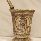 نجر منقوش يجمل عليه صوره الشيخ زايد رحمه الله