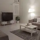 طاولة قهوة ومكتبة تلفزيون واضاءة سقف