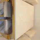 طاوله رخام ملكي بأرجل ذهبيه