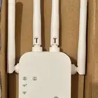 مقوي شبكة إنترنت . موسع نطاق Wi-Fi