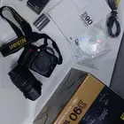 Nikon D90 كاميرا مع عدسة تامرون