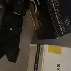 كاميرا نيكون مع عدسه