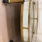 عربة تقديم حديد ذهبي وزجاج