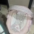 كرسي أطفال هزاز لون وردي