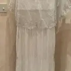 فستان فضي مديم او لارج لااعلم لانه تفصيل