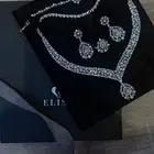 طقم مجوهرات فضي ولؤلؤ