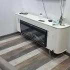 طاولة تلفزيون مع مدفاة