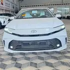 كامري ال اي هايبرد ابيض 2025