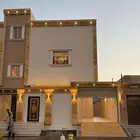 شقة ارضية للبيع حي اليرموك(مدخل سيارة مطبخ راكب مساحه كبيره)