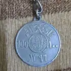 للبيع ميدالية قديمة على شكل ريال قرش