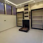 شقه ملحق للبيع مع مشب ومصعد راكب   5 غرف وصاله