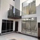 زجاج سيكوريت ودرابزين درج اسكاى