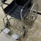 كرسي متحرك عربية.