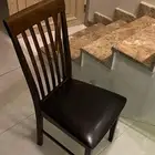 كرسي خشب مع قاعده جلد