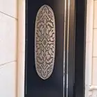 دهان ابواب حديد وخشب