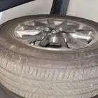 جنوط تايوتا وكاله مع كفرات برجستون استعمال خفيف مقاس 15 تركب