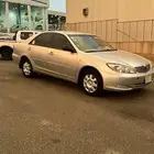 كامري للبيع او للبدل 2003