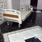 سرير طبي كهربائي