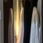 فستان اسود و بيج و كرستال على الخواصر